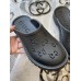 Gucci slip-on sandal Black perforated GG rubber